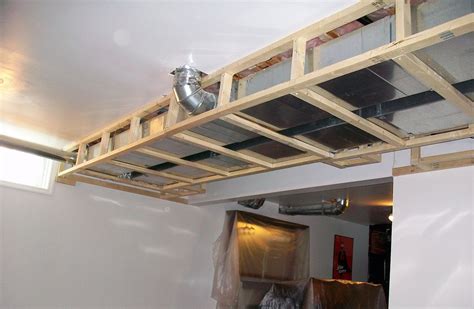 90 metal bracket to hide pipes in ceiling|hide exposed pipes on ceiling.